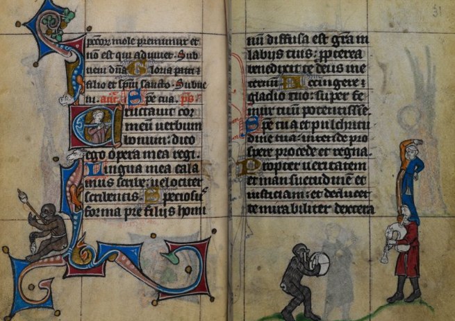 Medieval manuscript page with acrobat balanced on bagpiper's shoulders in the margin; text above in Gothic script.