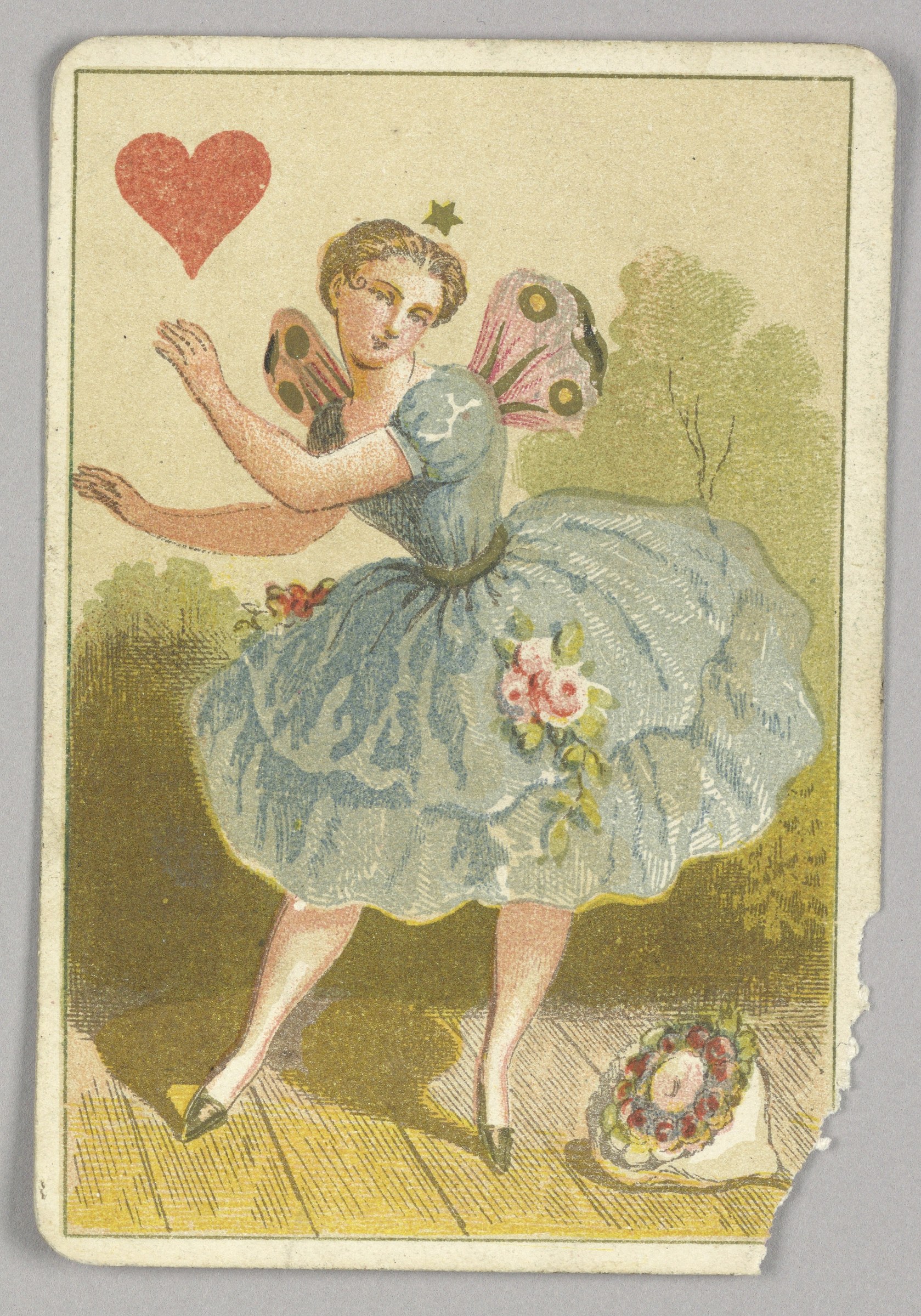 A winged female dancer in a pale blue tulle skirt hovers in mid-air, arms raised, with a star above her head and flowers at her feet.