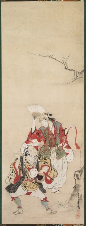Two figures in red and white festive costume, bent-kneed and gesturing energetically, one holding a fan, both wearing ankle ornaments, with a bare branch above.