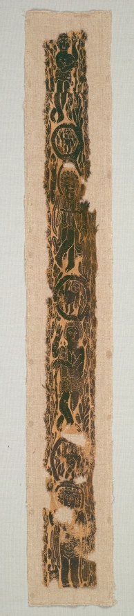 Vertical tapestry band with four figures in silhouette among plants: two dancers in draped or bare dress with forward-leaning postures and two shepherds with