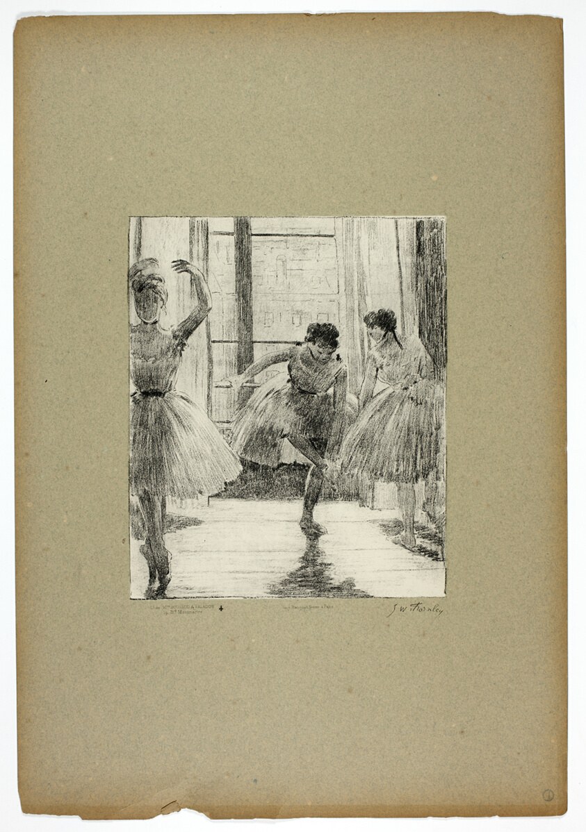 Three young ballet dancers in tutus in a studio; the central dancer executes a step while the others watch.