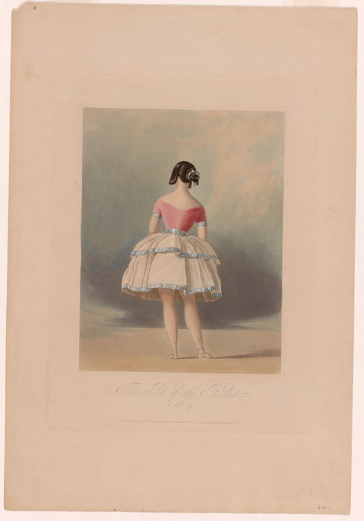 A young female ballet dancer in a coral bodice and white tulle skirt stands alone, viewed from behind, wearing pointe shoes.