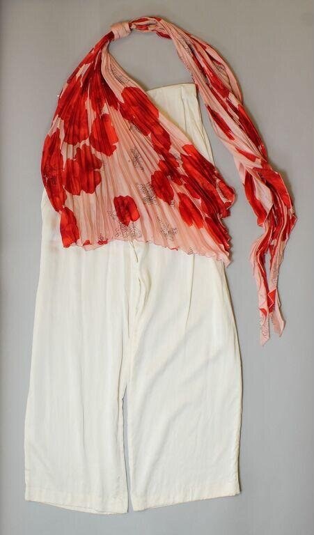 Cream linen shift dress displayed with a voluminous red and pink floral-printed shawl draped across the shoulders.