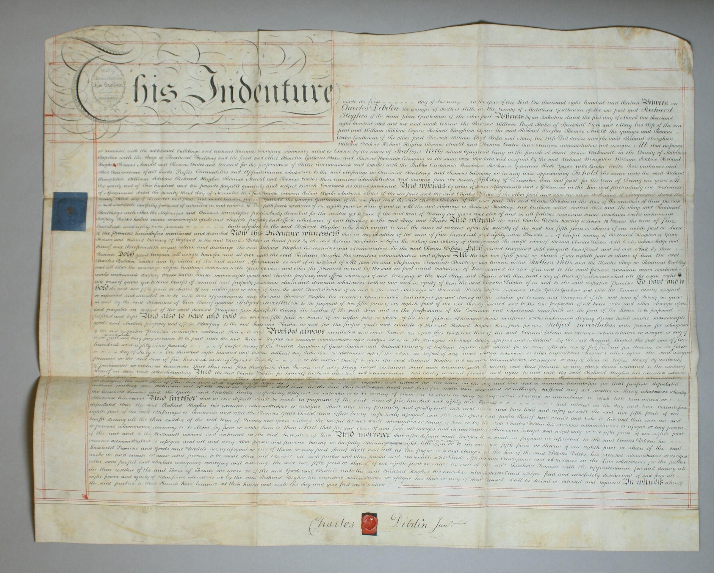 Formal handwritten indenture document on aged parchment dated 1813, with ornamental header and signatures of Charles and Vialdin.