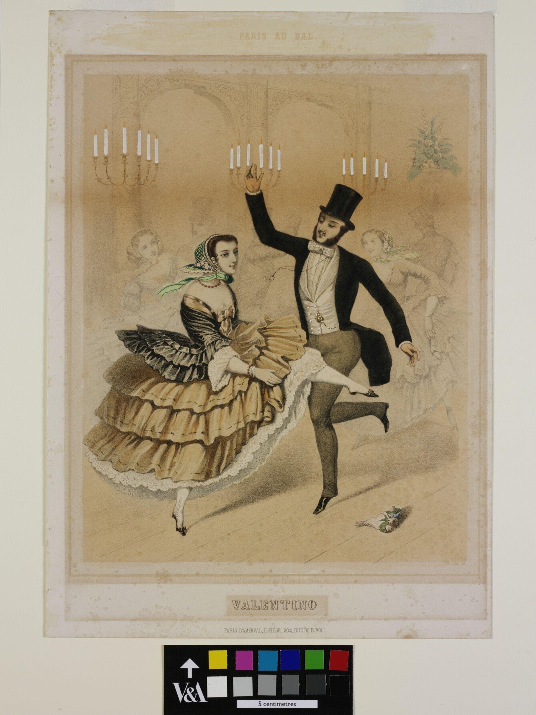 A man in a black tailcoat and top hat holds aloft a candelabra while waltzing with a woman in a pale silk gown with black lace ruffles in a grand ballroom.