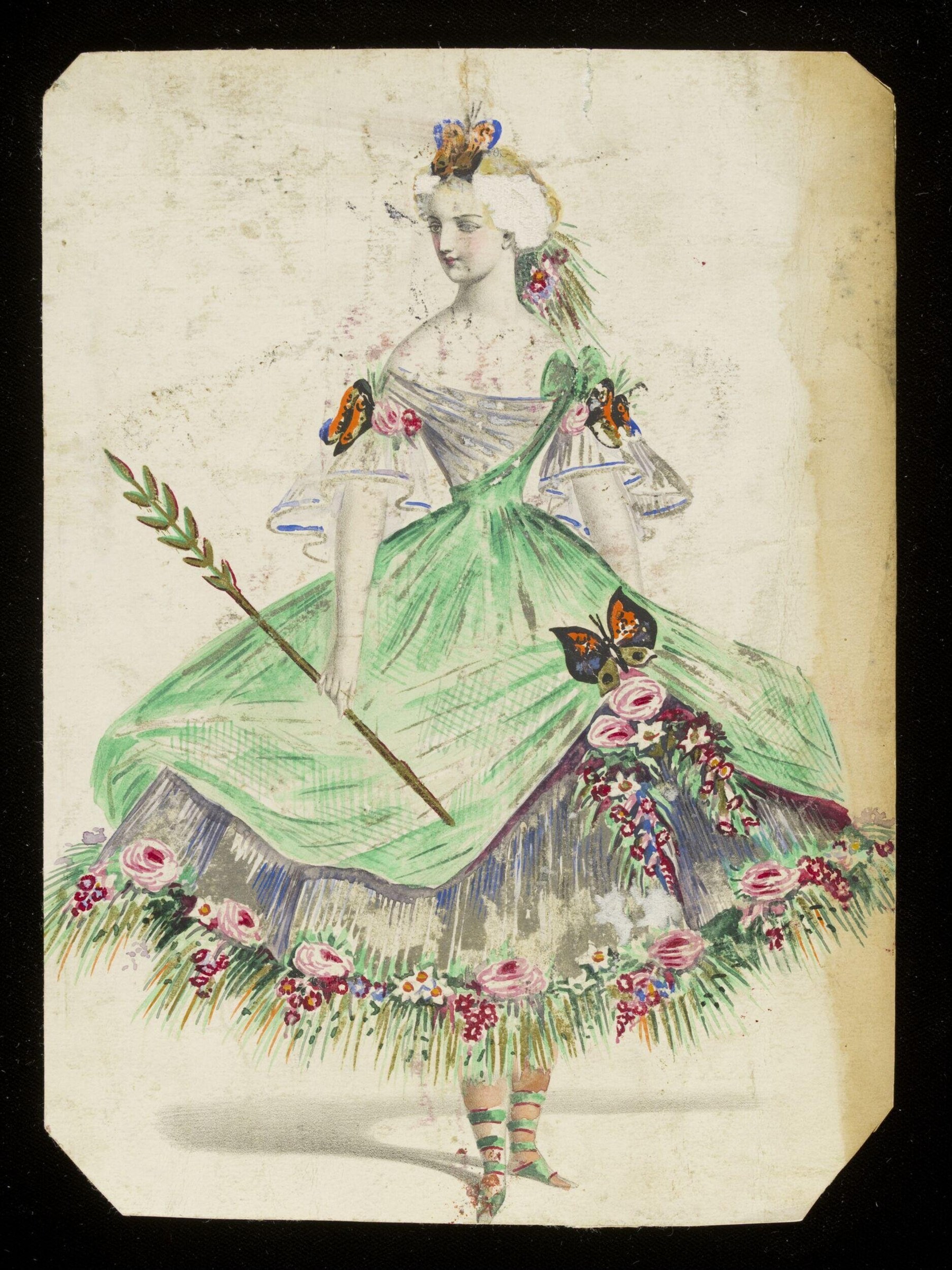 Hand-colored design drawing of a woman in an elaborate insect-wing costume with green silk skirts, floral embroidery, butterflies, and an ornamental headdress.