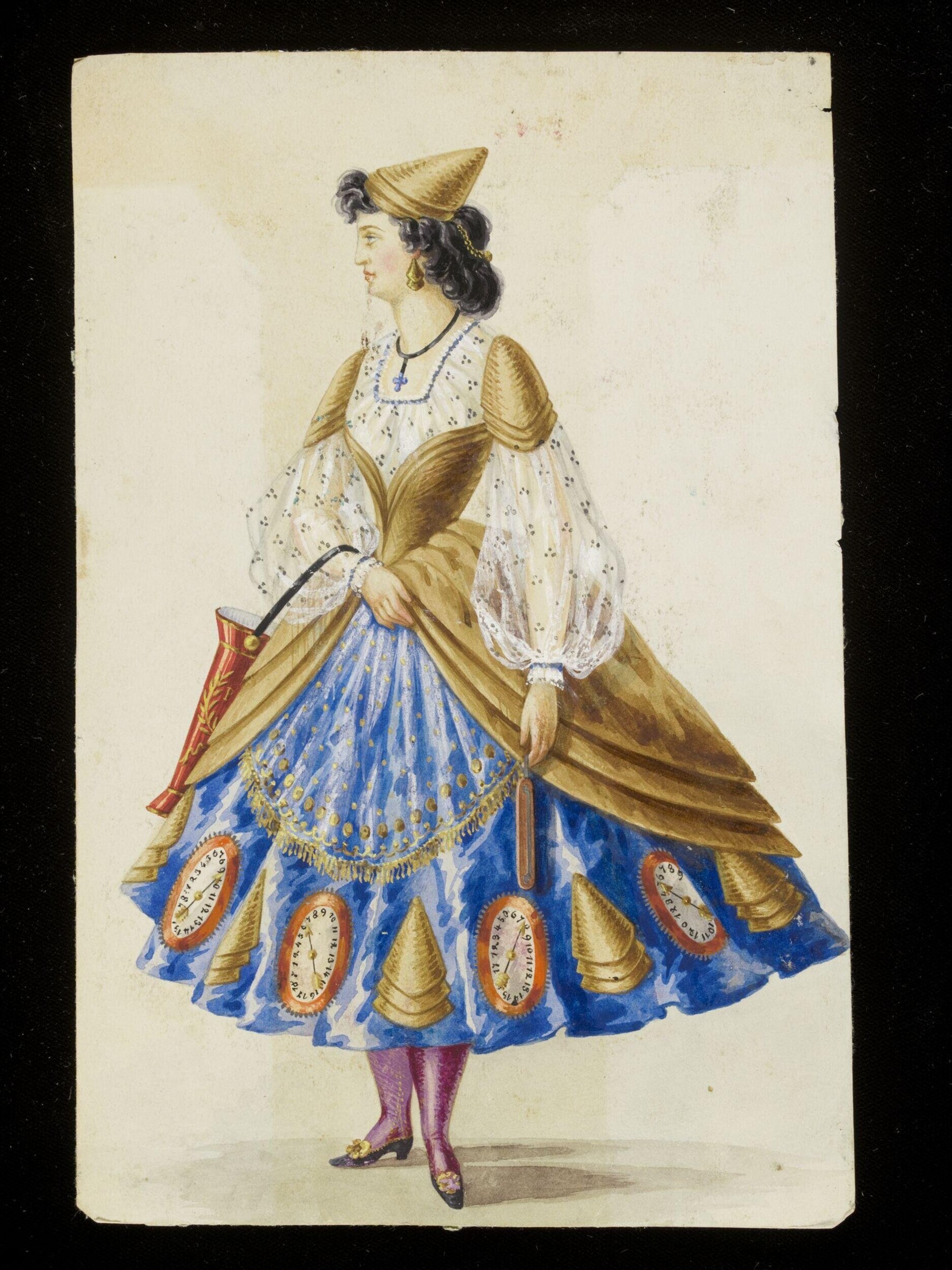 Full-length portrait of a woman in elaborate 1860s fancy-dress costume with blue skirt, golden cloak, and pointed hat, holding the cloak at her side.