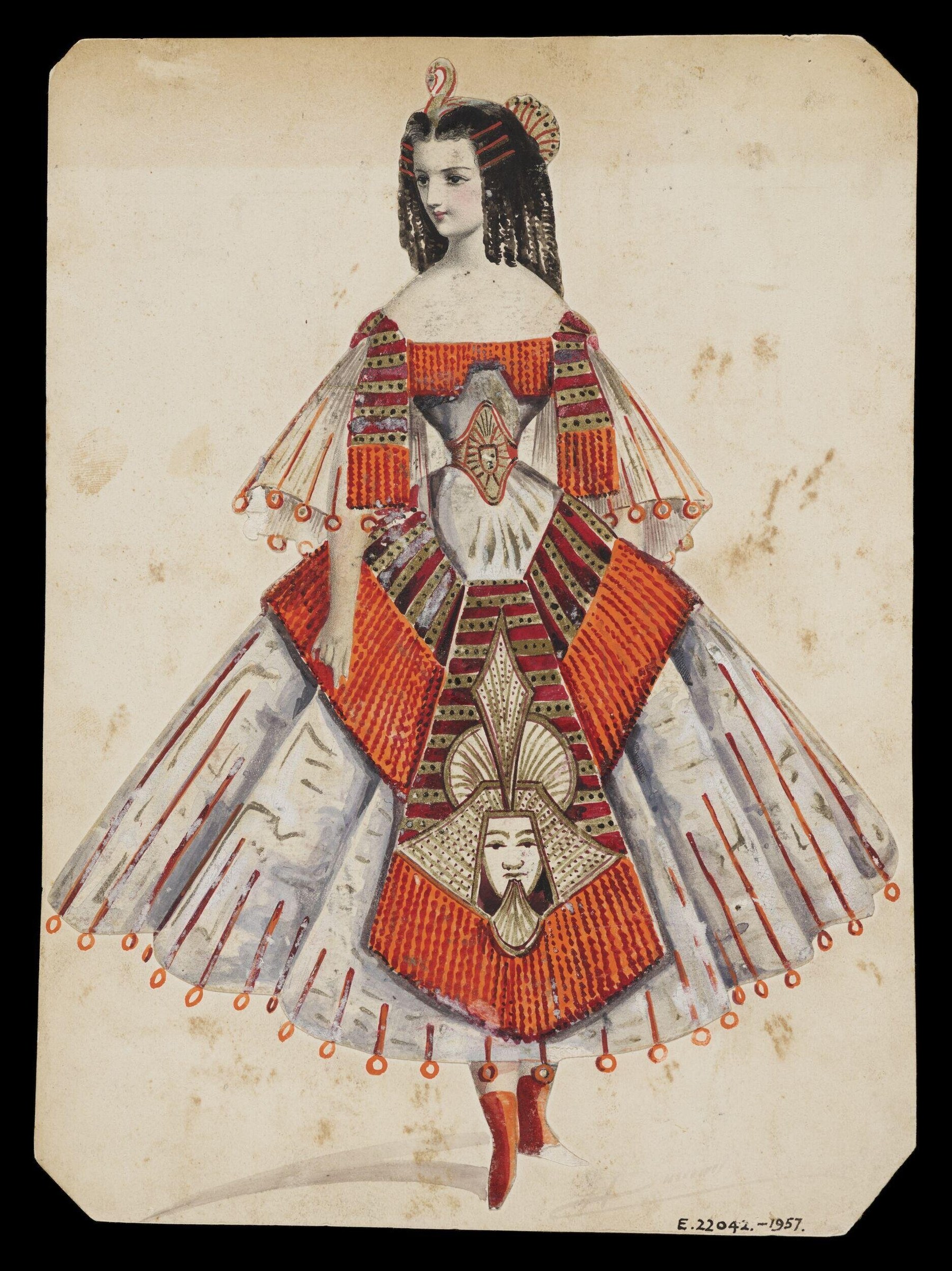 Full-length costume design drawing of a woman in ornate fancy dress with Egyptian-inspired elements, hanging beads, and wing-like structures.