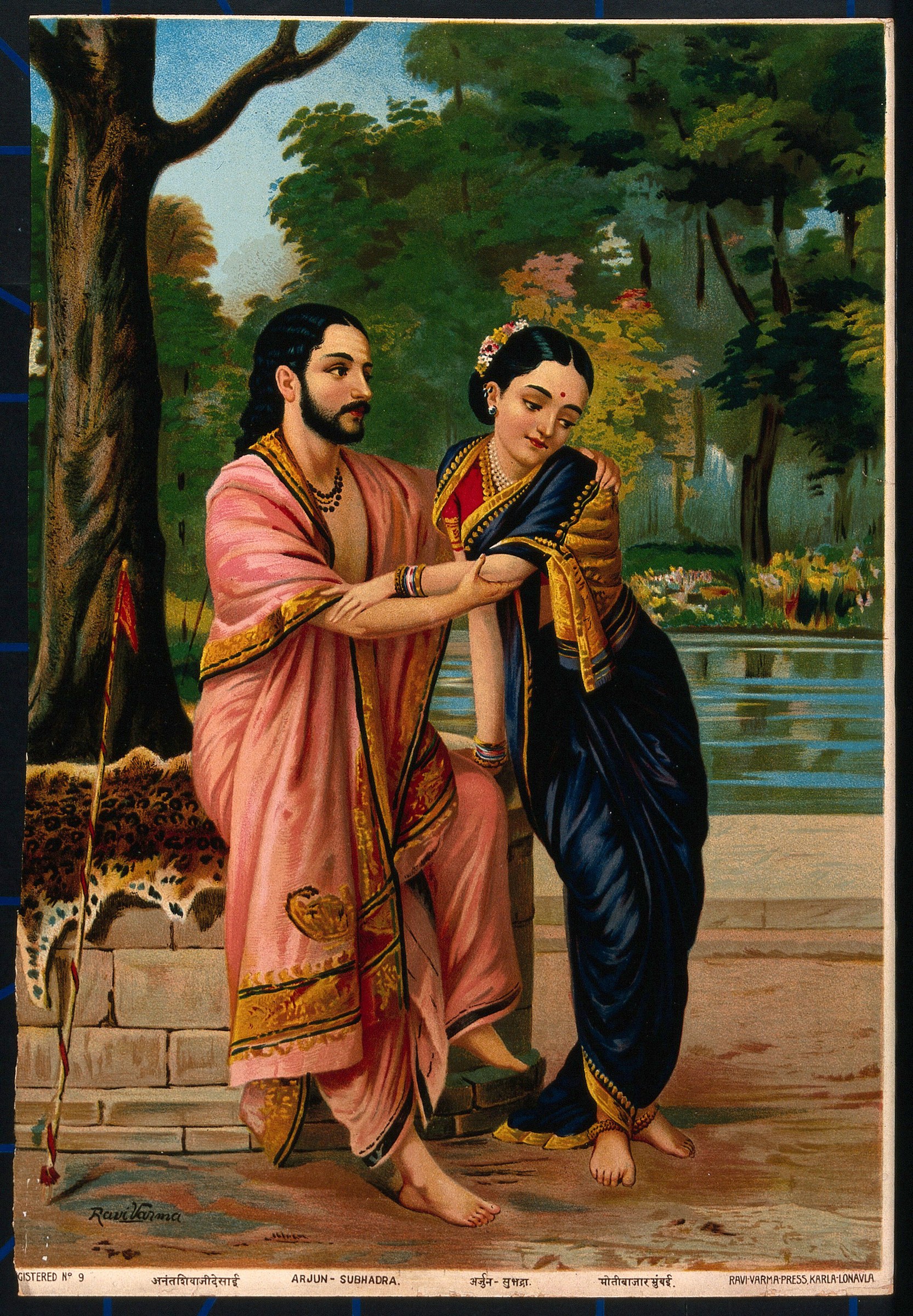 Man in rose dhoti with gold trim faces woman in indigo sari beside a tree in a garden setting, in classical Indian dress and poses.