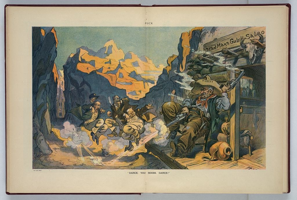 Soldiers in military uniforms dance wildly and clumsily around a campfire in a rocky canyon, with a ramshackle saloon behind them.